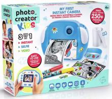 white box showing a blue kids instant print camera printing a picture and the contents of the box including stickers and markers 